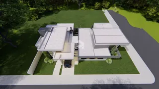 Vista aérea da casa moderna com jardim em Lajeado.