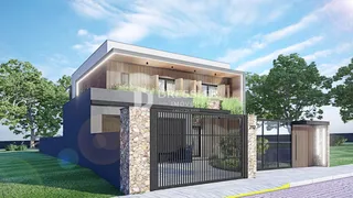 Fachada moderna de uma residência em Lajeado, Brasil, com portão de ferro.