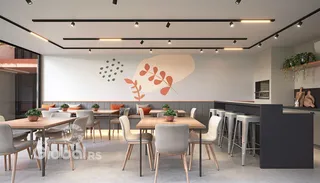 Uma sala de jantar moderna com mesa de madeira e decoração contemporânea.