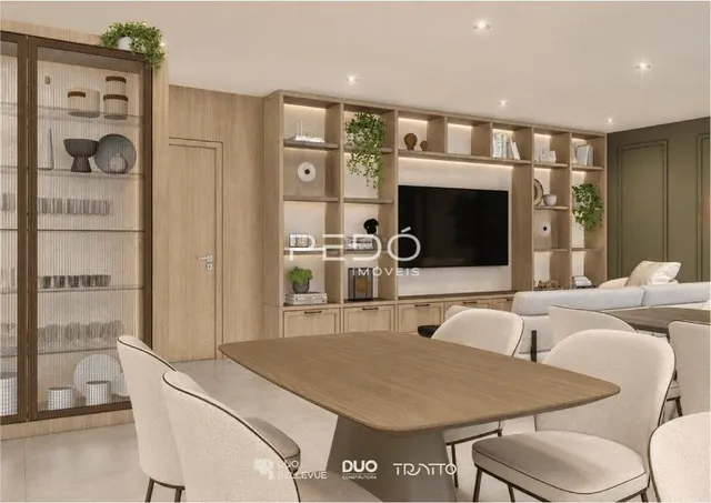 Sala de estar com estantes e mesa de jantar em ambiente interno.