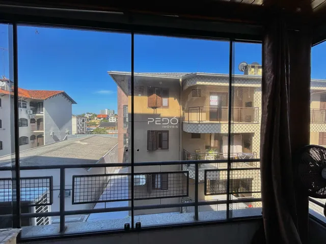 Vista da fachada de um prédio residencial em Lajeado, Brasil.