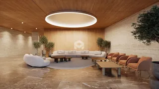 Sala de estar com sofá circular e piso de mármore claro.
