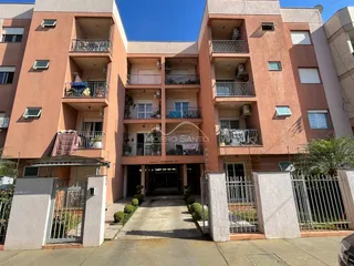 Fachada de um prédio residencial de apartamentos em Lajeado, Brasil, com vários andares e varandas.