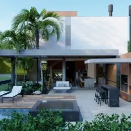 Vista externa de um deck com palmeiras em uma residência em Lajeado.