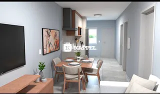Sala de estar com televisão e piso de madeira.
