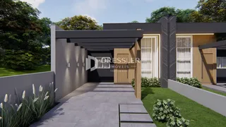 Fachada moderna de uma residência em Lajeado, Brasil, com jardim frontal.