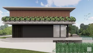 Fachada moderna de uma residência com telhado verde em Lajeado, Brasil.