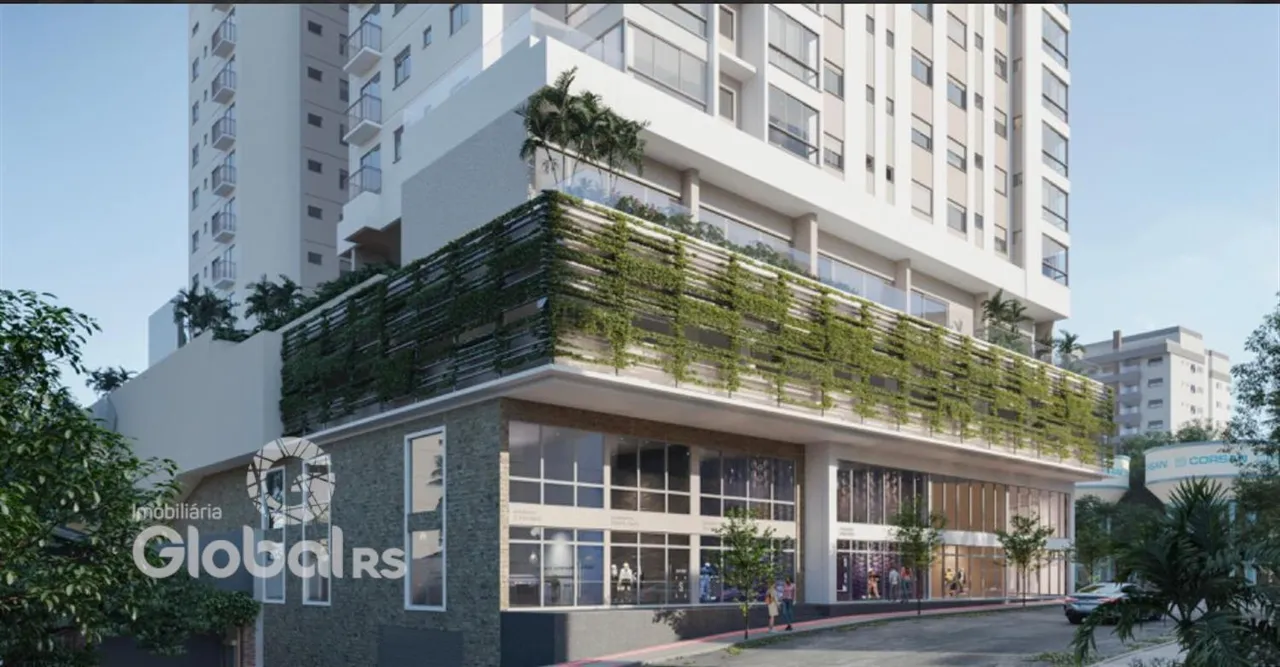 Fachada de um edifício residencial com telhado verde em Lajeado, Brasil.