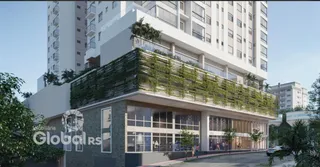 Fachada de um edifício residencial com telhado verde em Lajeado, Brasil.
