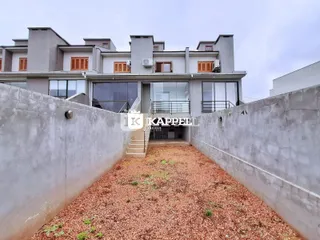 Foto da fachada de um prédio residencial moderno em Lajeado, Brasil.