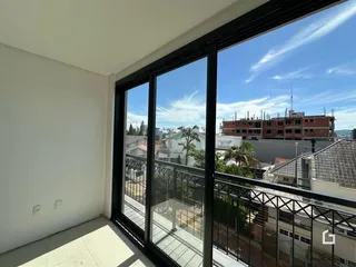 Vista da janela de um imóvel em Lajeado, Brasil com vista para a paisagem urbana.