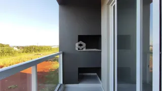 Vista da fachada de uma residência com varanda em Lajeado, Brasil.