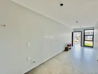 Hall de entrada de um imóvel em Lajeado, Brasil.