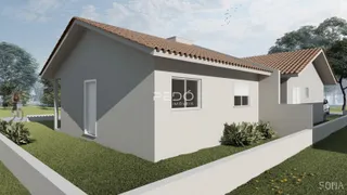 Fachada de uma casa em Lajeado, Brasil, com telhado de telhas.