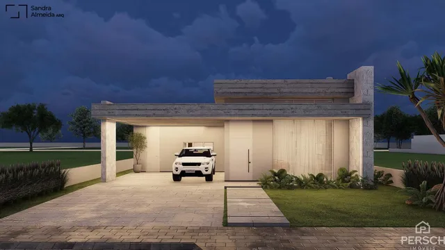 Fachada moderna de uma residência com paisagismo e garagem.