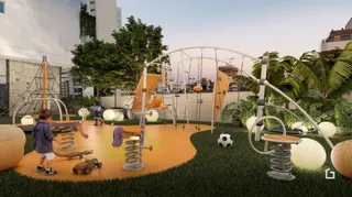 Área externa com playground e vegetação em Lajeado.