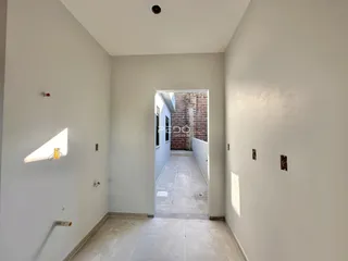 Corredor interno de uma residência em Lajeado.