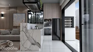 Vista da cozinha moderna com bancada de mármore e armários de madeira.