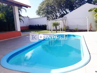 Foto de uma piscina externa em uma propriedade em Lajeado.