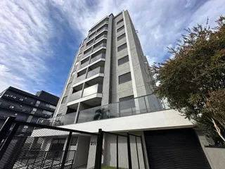 Foto da fachada de um prédio de apartamentos moderno em Lajeado, Brasil.