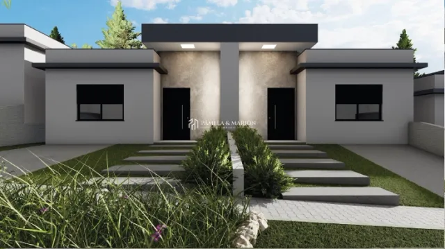 Fachada de uma residência moderna com jardim na cidade de Lajeado, Brasil.
