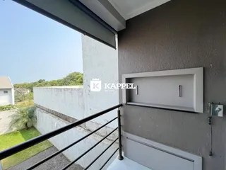 Vista da varanda com grade metálica em um imóvel em Lajeado.