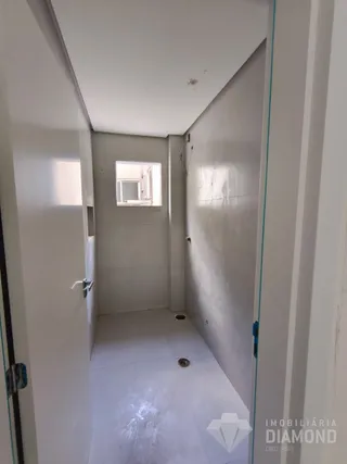 Foto de um corredor interno de uma propriedade residencial.