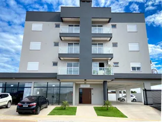 Fachada de um prédio residencial moderno com varandas em Lajeado, Brasil.