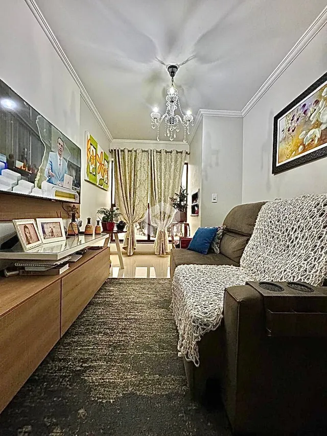 Foto da sala de estar de um imóvel em Lajeado, Brasil.