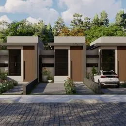 Fachada moderna de uma residência em Lajeado, Brasil, com paisagismo frontal.