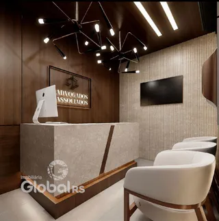 Interior de um escritório moderno com recepção e assentos em Lajeado.