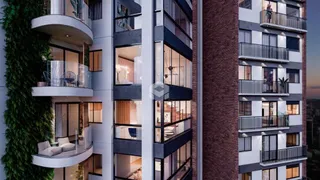 Fachada de um prédio residencial em Lajeado, Brasil com vários terraços.
