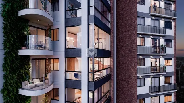 Fachada de um prédio residencial em Lajeado, Brasil com vários terraços.