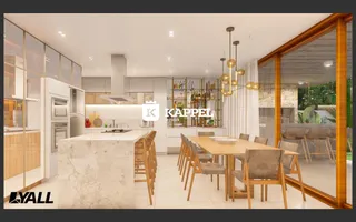 Ambiente de jantar moderno com mesa de madeira e iluminação de pendente.
