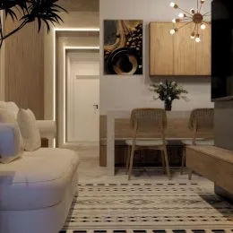 Uma sala de estar com sofá e piso estampado é visível na propriedade.