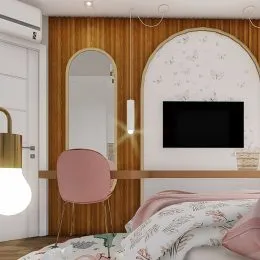 Quarto com cabeceira e decoração de parede em um imóvel.