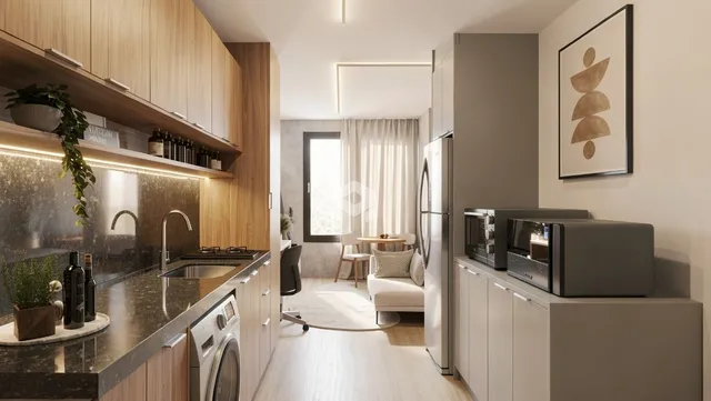 Cozinha moderna com armários de madeira e bancadas de granito em um apartamento.