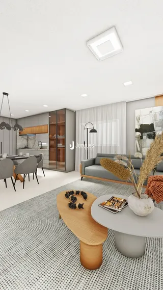 Sala de estar moderna com sofá e mesa de centro em um apartamento.