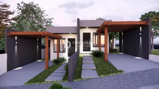 Fachada moderna de uma residência com garagem e jardim em Lajeado, Brasil.