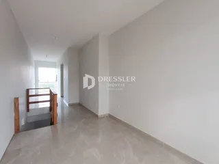 Foto de um corredor interno de uma residência em Lajeado.