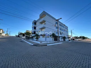 fachada de um prédio residencial em Lajeado, Brasil sob céu azul