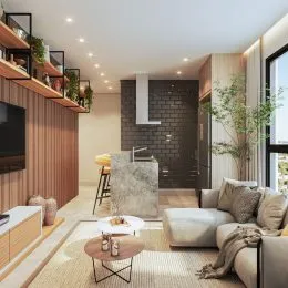 Uma sala de estar com sofá e piso de madeira é apresentada na propriedade.
