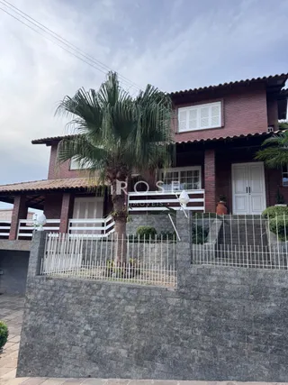 Casa com 4 dormitórios, foto 1