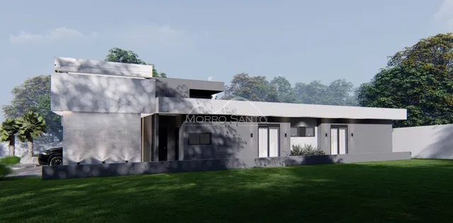 Fachada moderna de uma casa residencial em Lajeado, Brasil, com jardim gramado.
