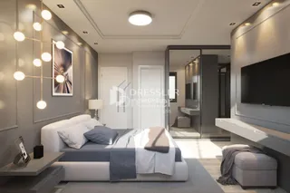 Quarto moderno com cama e decoração clara.