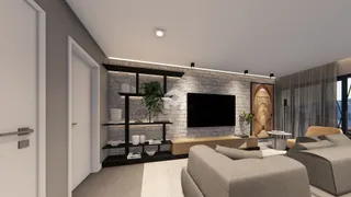 Sala de estar moderna com lareira e televisão.