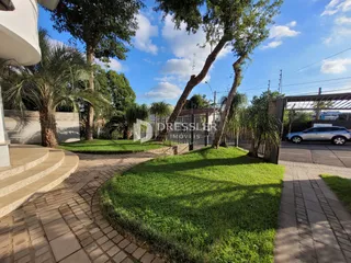 Vista externa do jardim e entrada da propriedade em Lajeado.