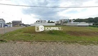 Vista externa de uma propriedade em Lajeado, Brasil, mostrando um terreno com vegetação.
