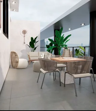 Sala de estar com móveis de vime e mesa de madeira em um apartamento.